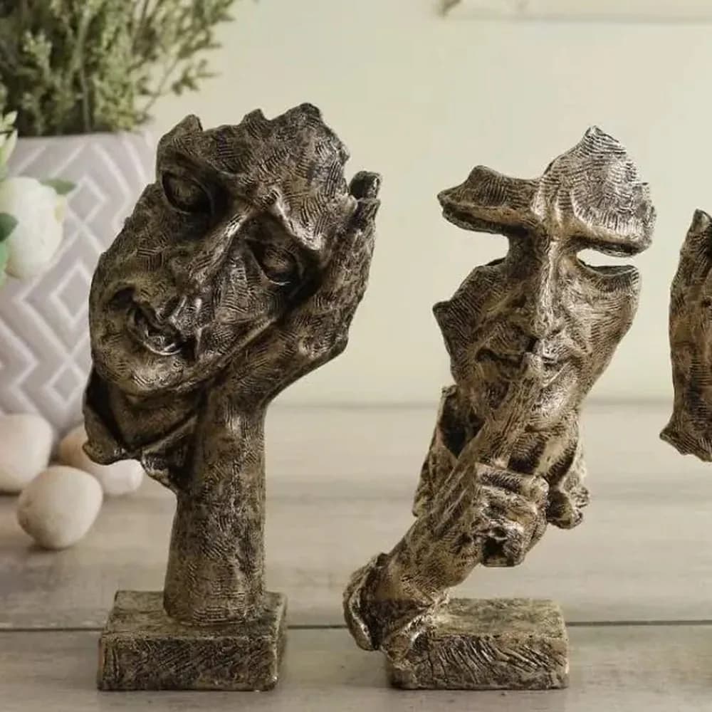 Silence trio abstract face sculptures — detail