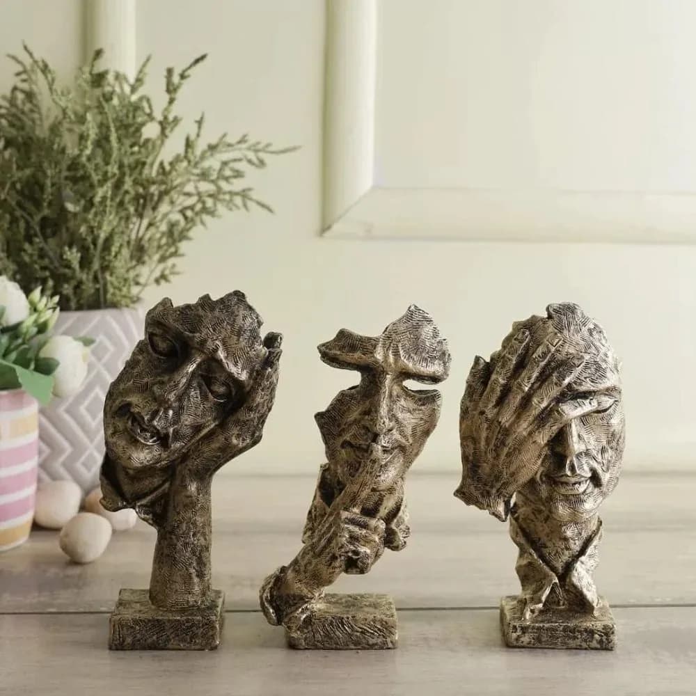 Silence trio abstract face sculptures