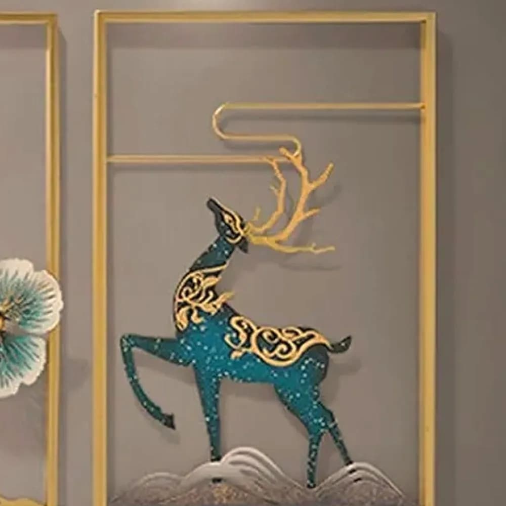 Gilded deer & blossom metal wall art — in the room